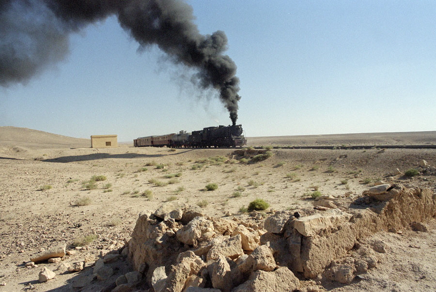 Steam locomotive 51 & train in desert, heading north from Qatrana to Amman, Hedjaz Railway, Jordan