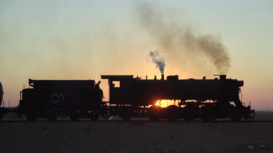 Steam locomotive 51 & sunset in desert, Hedjaz Railway, Jordan