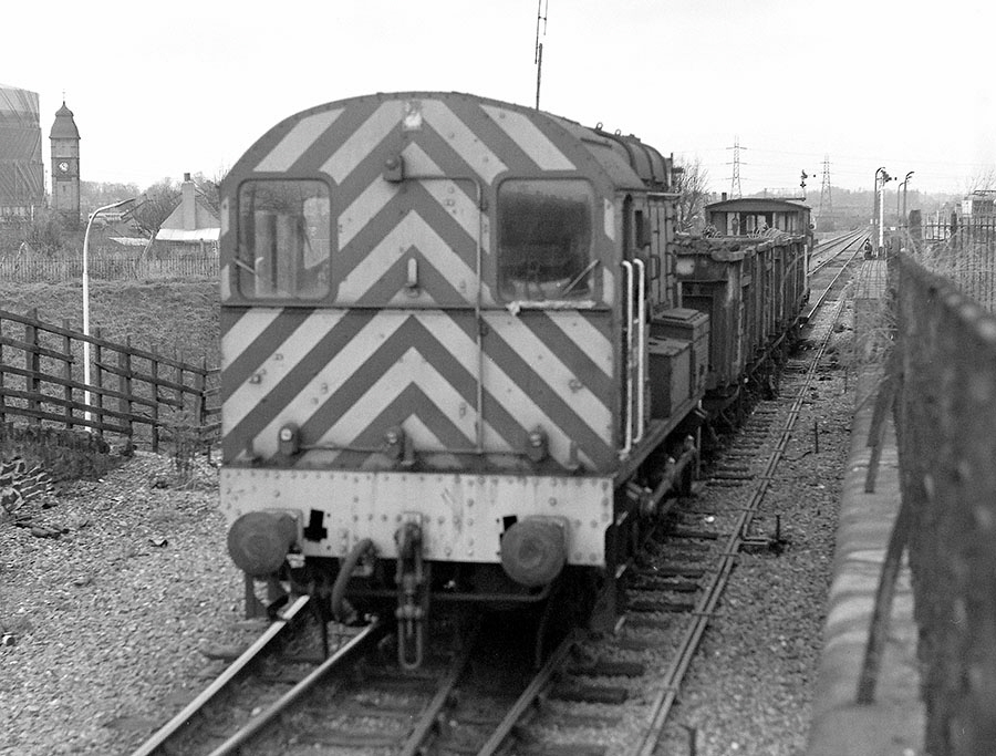 0-6-0 diesel shunter no. 08619 propels empty wagons to be loaded with scrap in the ex-Great Central goods yard at the junction with the Leicester to Burton line at Saffron Lane, Leicester