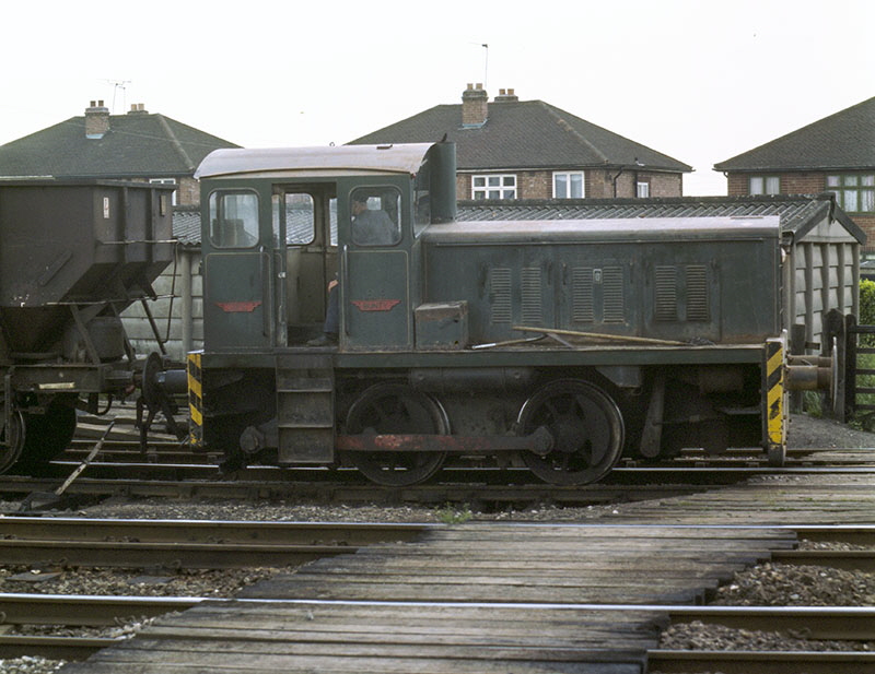 Fowler/Thomas Hill 0-4-0 diesel locomotive shunting wagons of granite chippings at the Mountsorrel sidings, Leicestershire