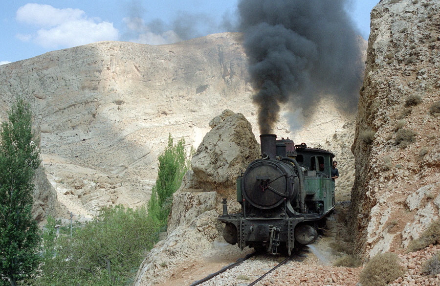 Steam locomotive with train in mountains between Damascus and Serghaya, Hedjaz Railway, Syria